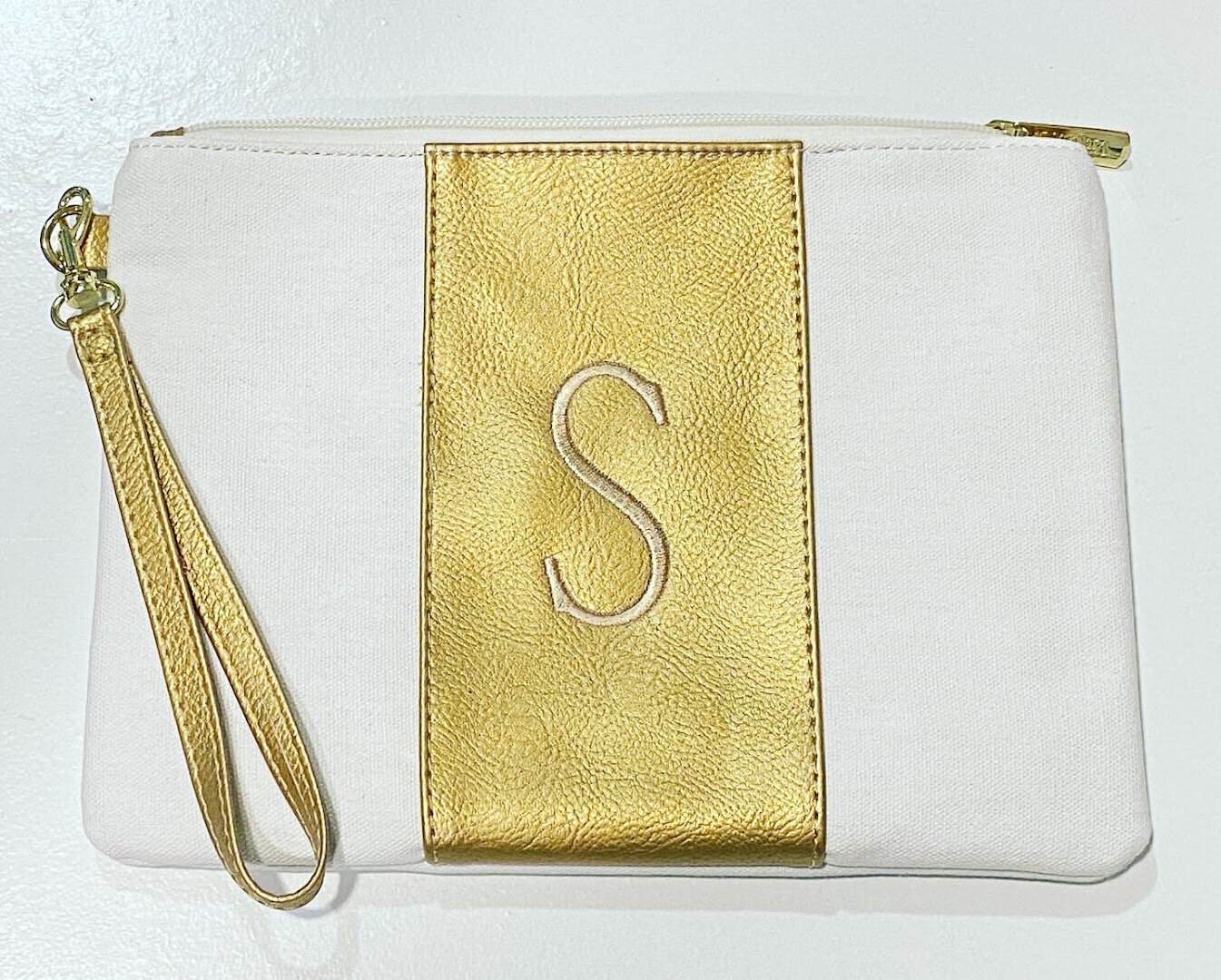 Gold monogrammed wristlet custom embroidered at The Sparkly Elephant Sewing Lounge