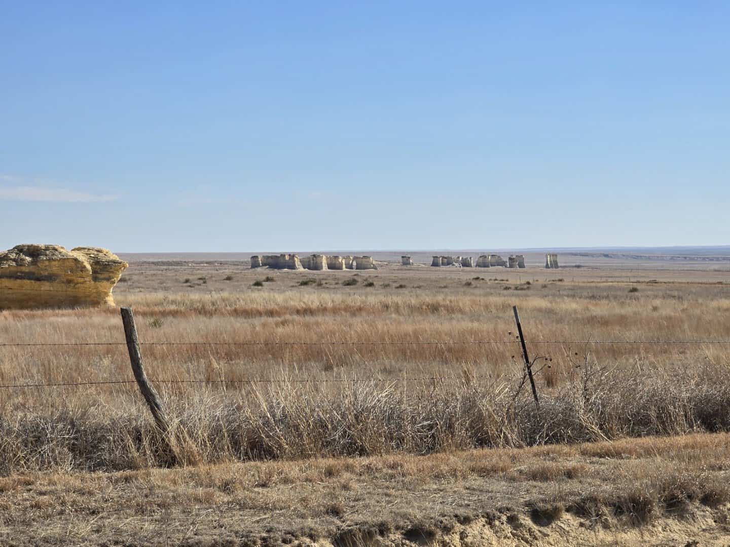 The chalk pyramid formations of Monument Rocks rising from the Kansas prairie