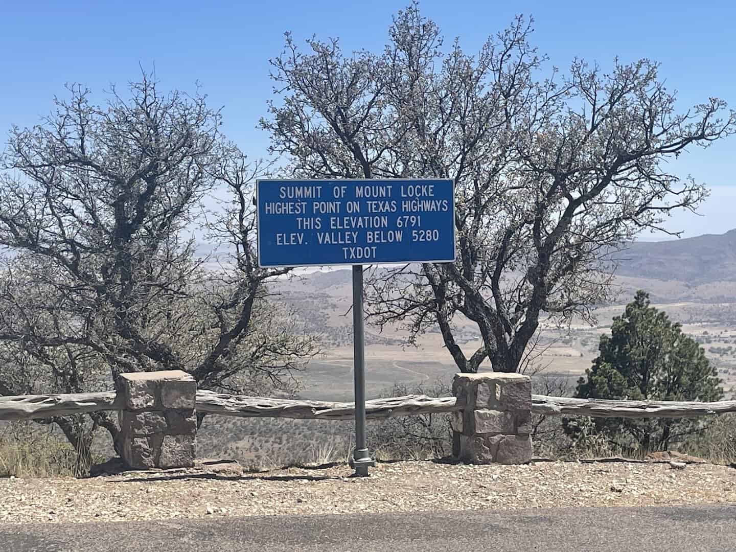 Sign at the summit of Mount Locke, the highest point on the Texas highway system, at McDonald Observatory