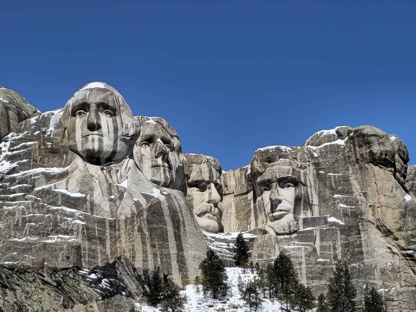 The four presidential faces carved into Mount Rushmore, South Dakota
