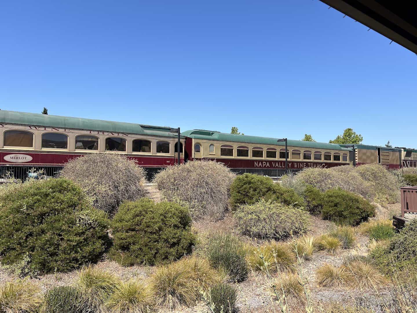 Napa Valley Wine Train passenger cars in the Napa Valley landscape, California