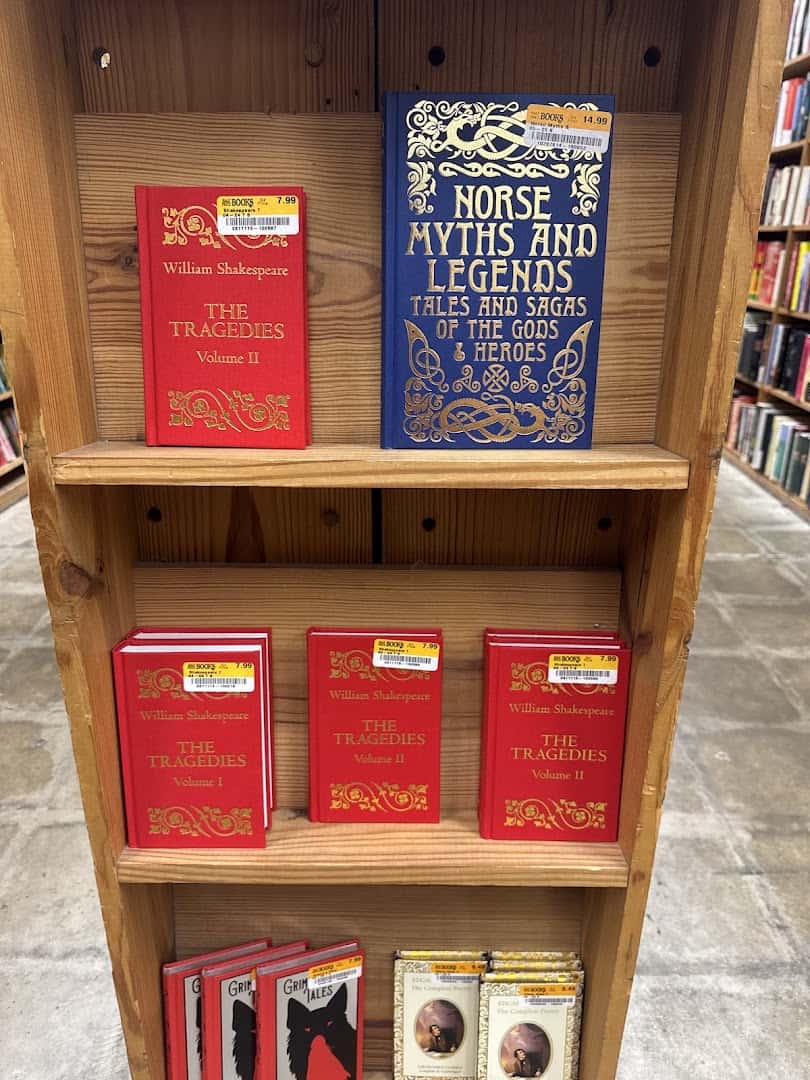 A shelf of older hardcover books at Half Price Books in Dallas
