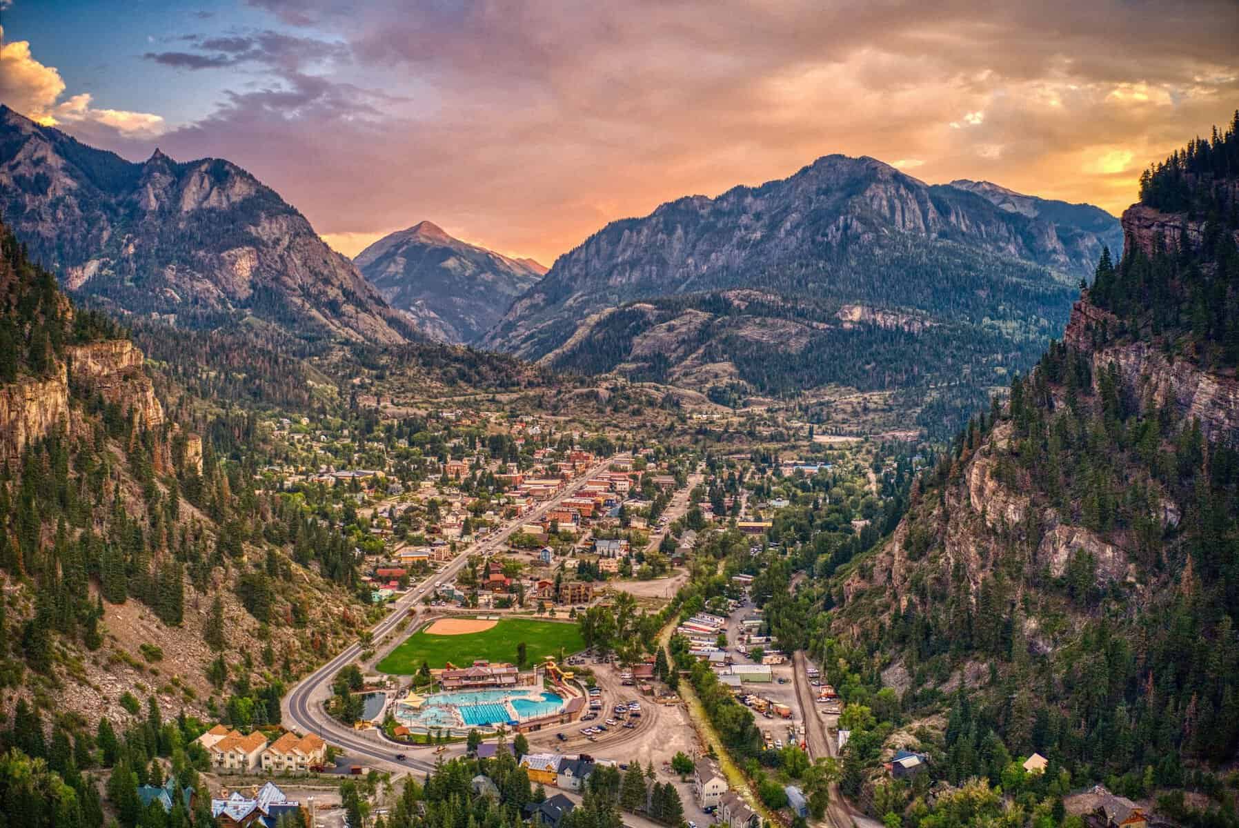 Ouray nestled in its box canyon beneath the San Juan Mountains at sunset, Colorado