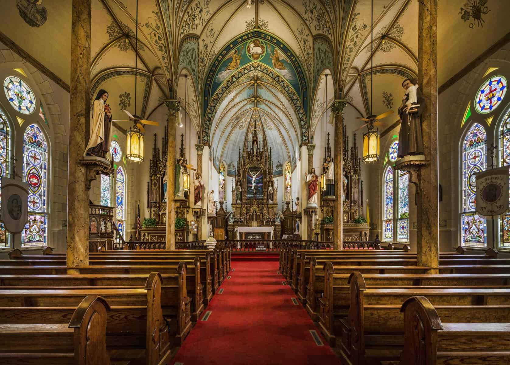 Painted interior and marbleized columns of St. Mary Catholic Church in High Hill, Texas