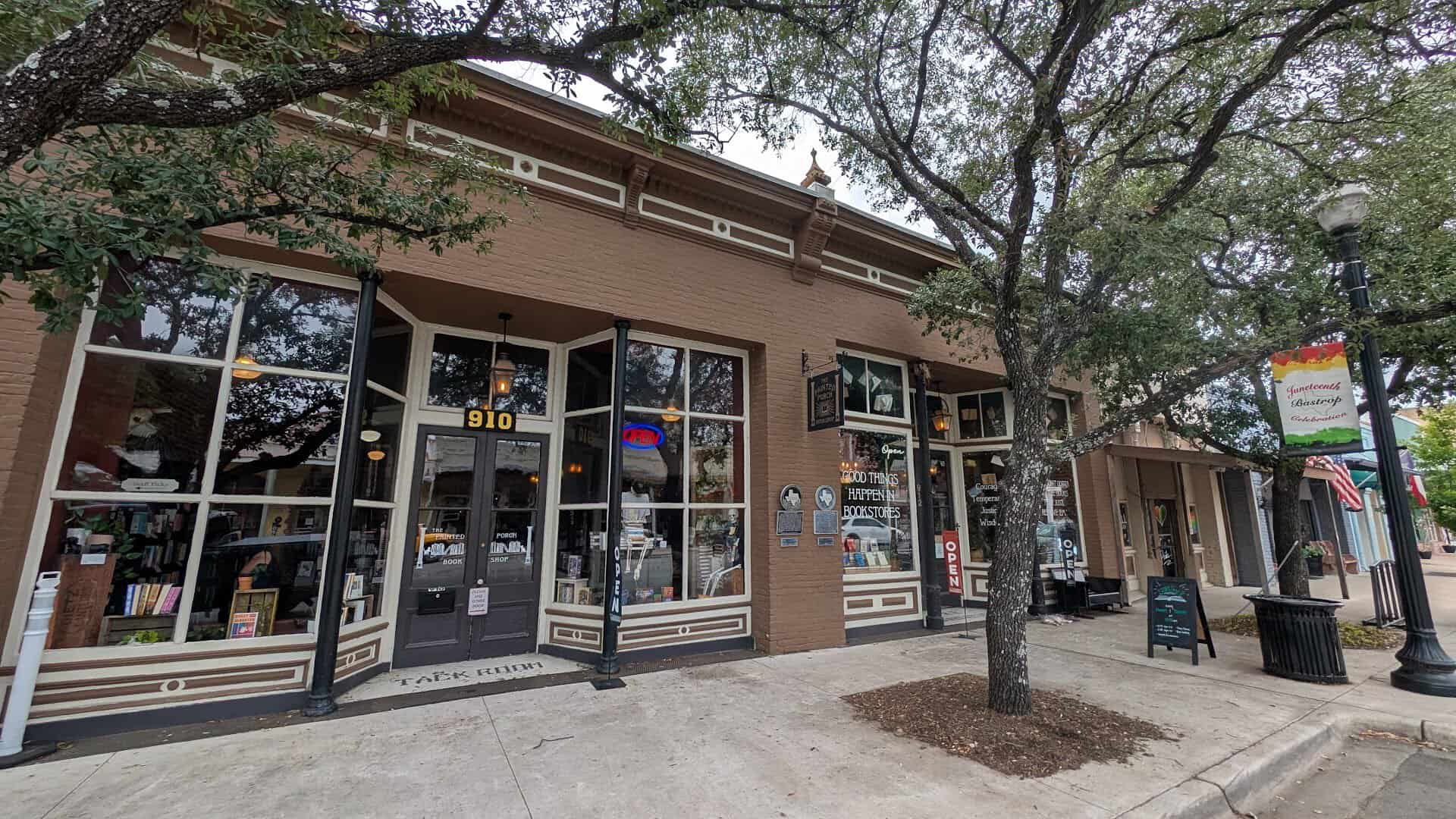 Storefront of The Painted Porch Bookshop on Main Street in downtown Bastrop, Texas