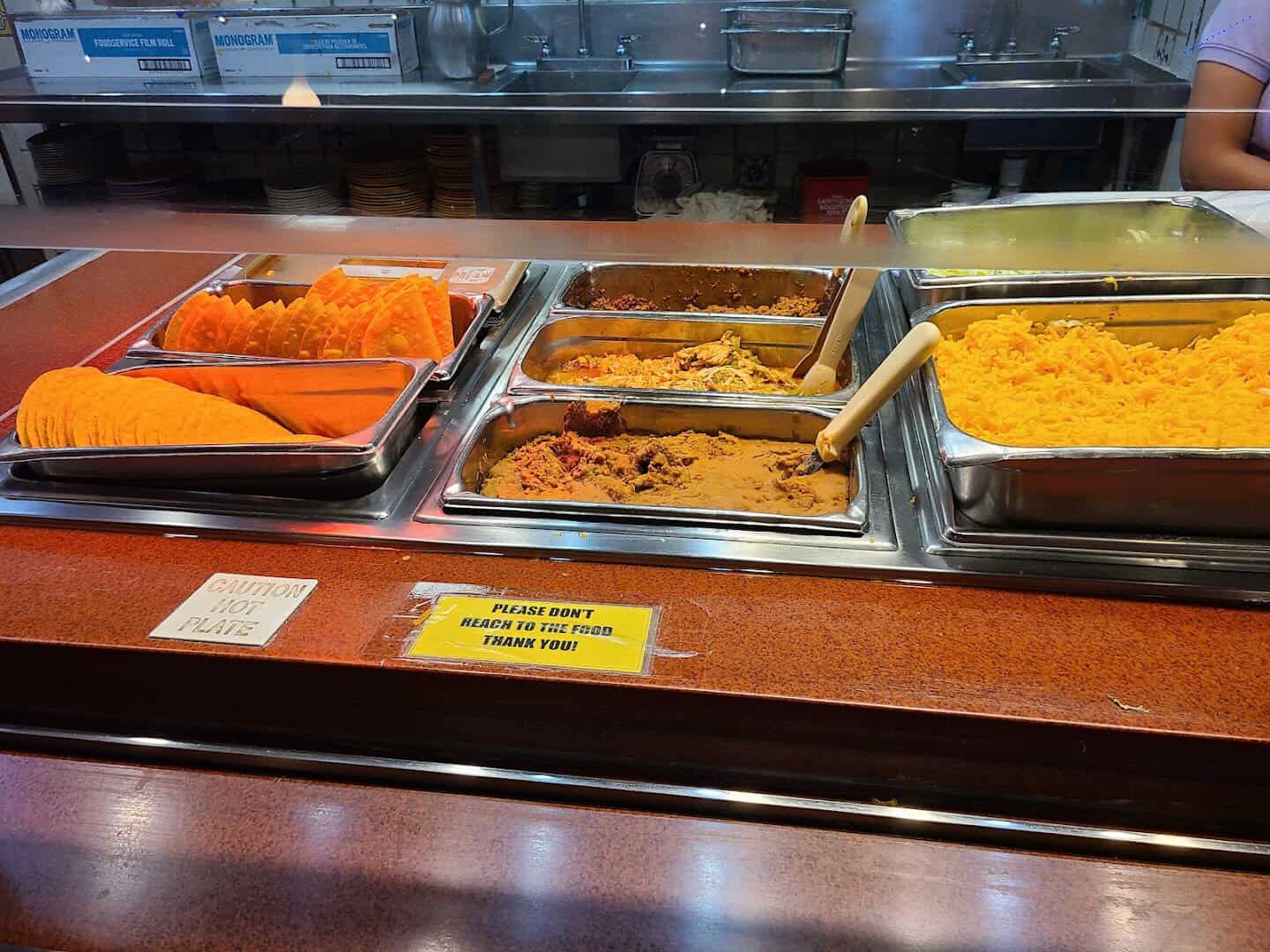 The buffet line of trays at Pancho's Mexican Buffet in Mesquite, Texas