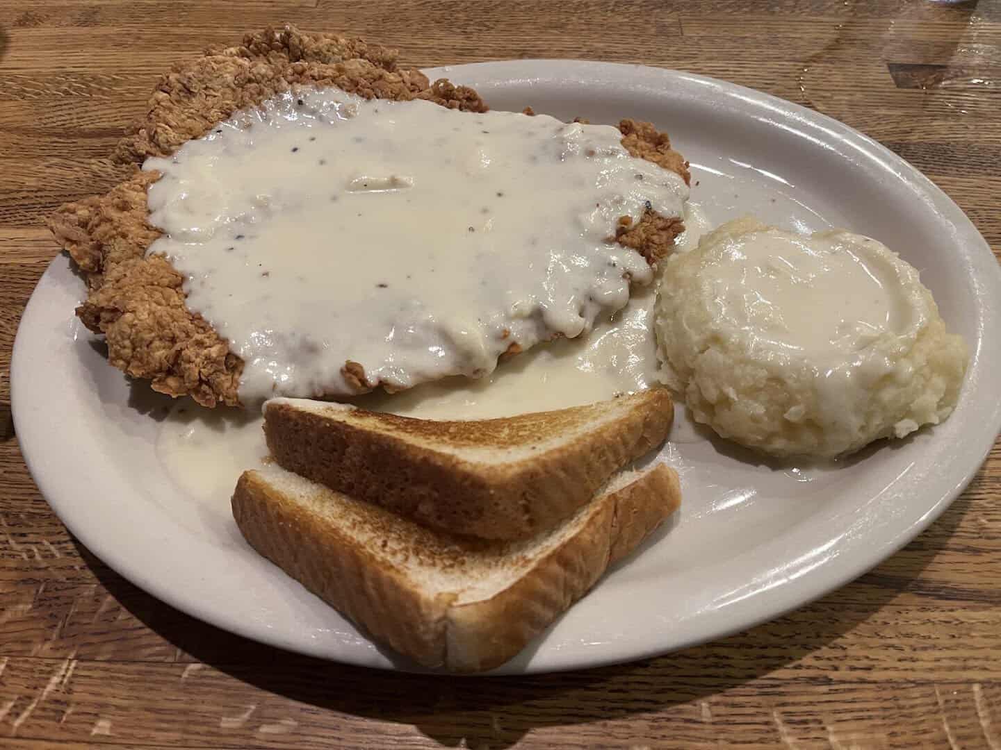 Chicken fried steak with cream gravy, Texas toast, and mashed potatoes at Pappy's Cafe in Houston, Texas