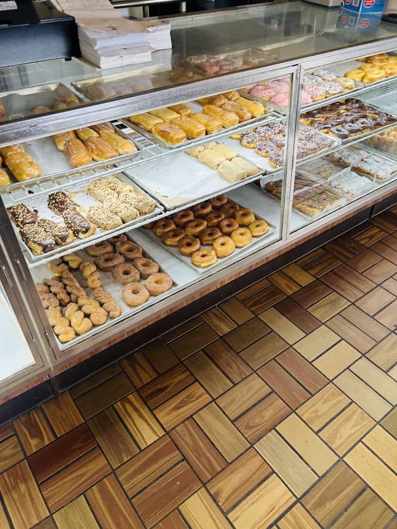 Rows of pastries and doughnuts in the case at Haby's Alsatian Bakery in Castroville, Texas