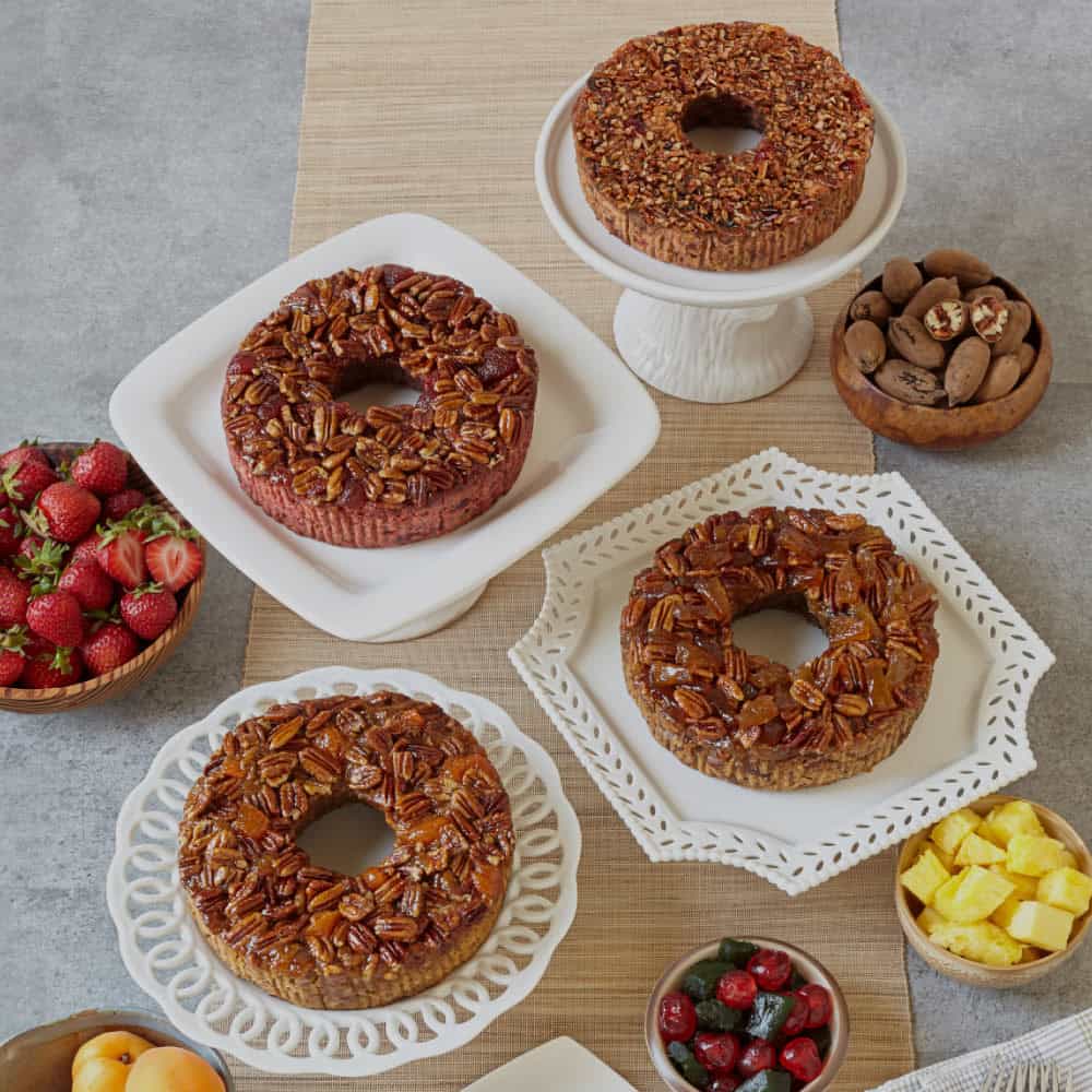 Three Texas pecan cakes with strawberries at Collin Street Bakery in Corsicana