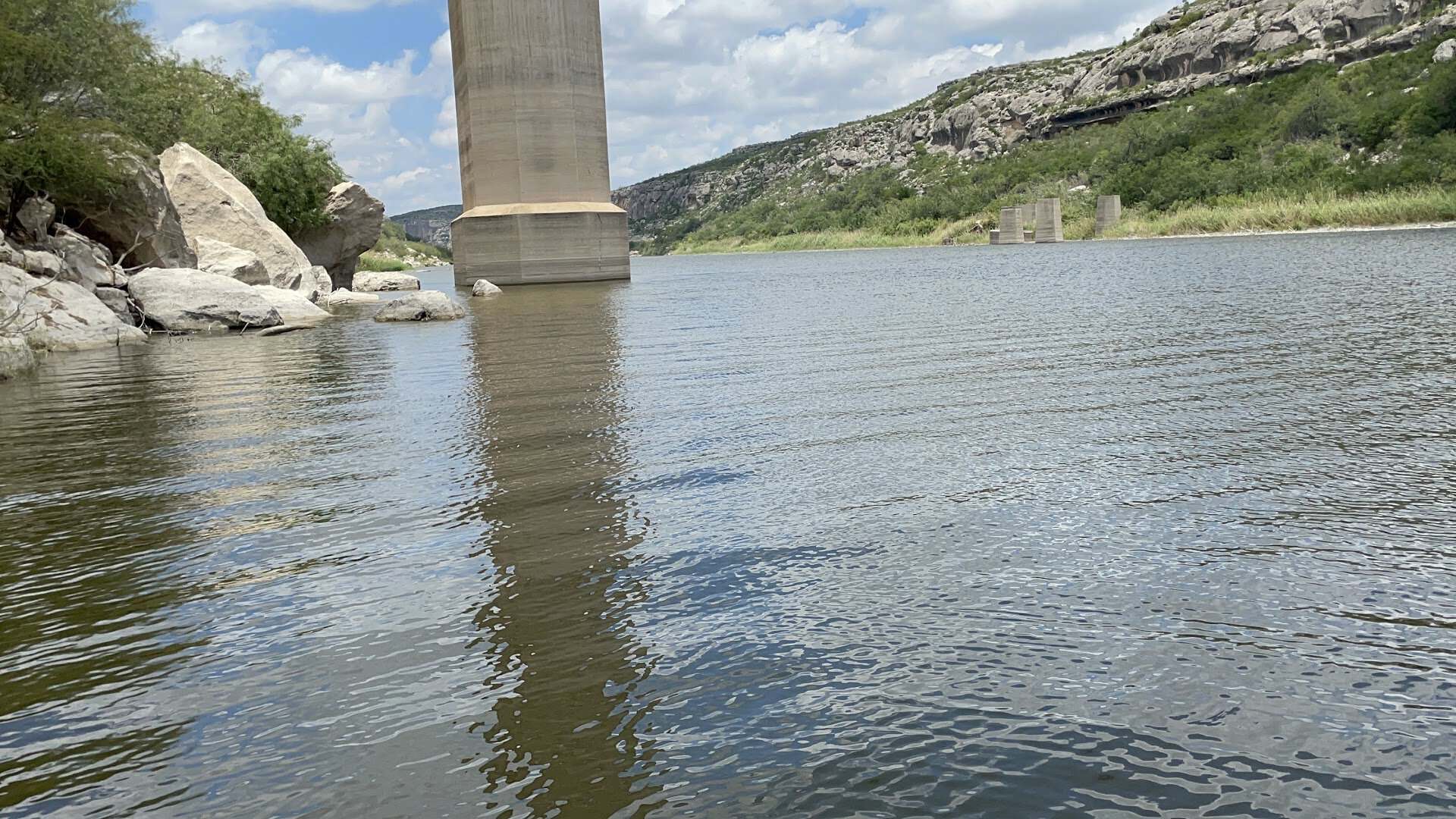 Concrete pier of the Pecos River High Bridge seen from the water on Lake Amistad
