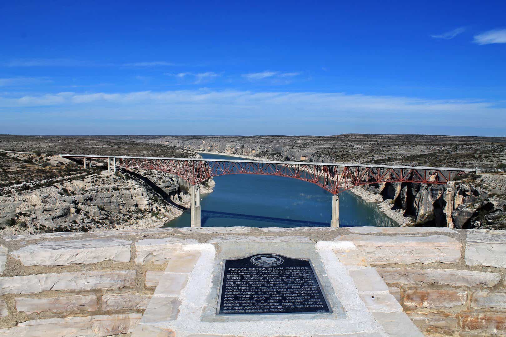 Texas historical marker at the Pecos River High Bridge overlook with the bridge behind