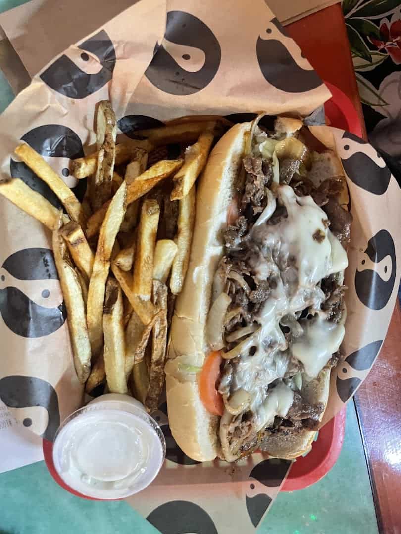 Philly cheesesteak with fresh-cut fries at Mel's Diner in Mingus, Texas