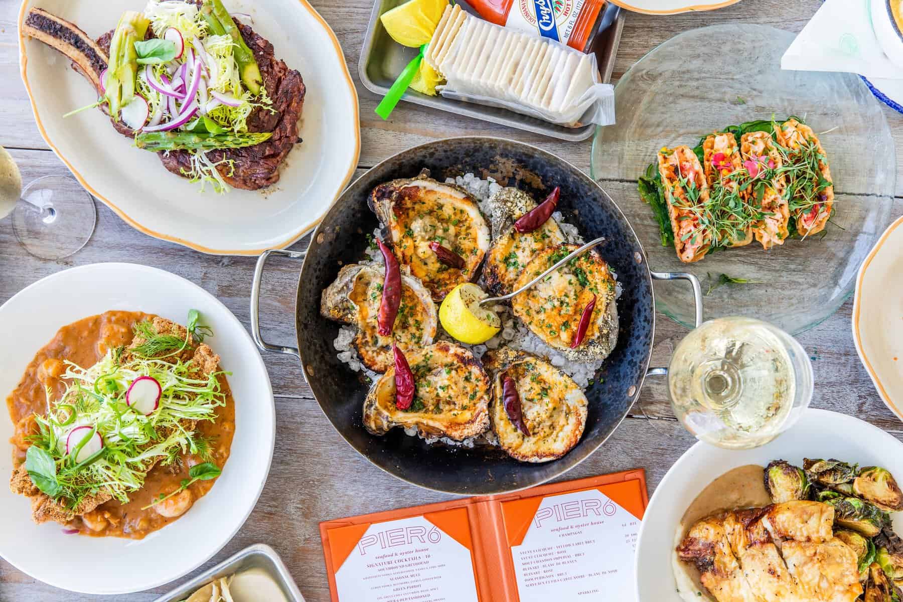 A spread of fresh Gulf seafood dishes at Pier 6 Seafood and Oyster House in San Leon, Texas