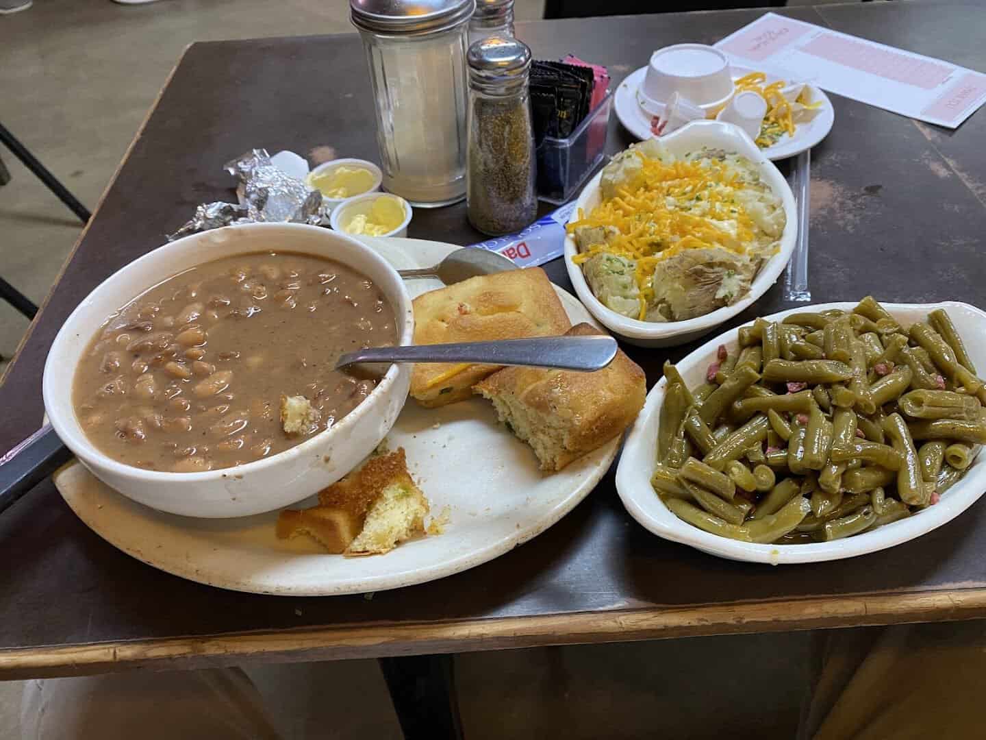 Pinto beans, cornbread, green beans and a loaded baked potato at Mary's Cafe in Strawn, Texas