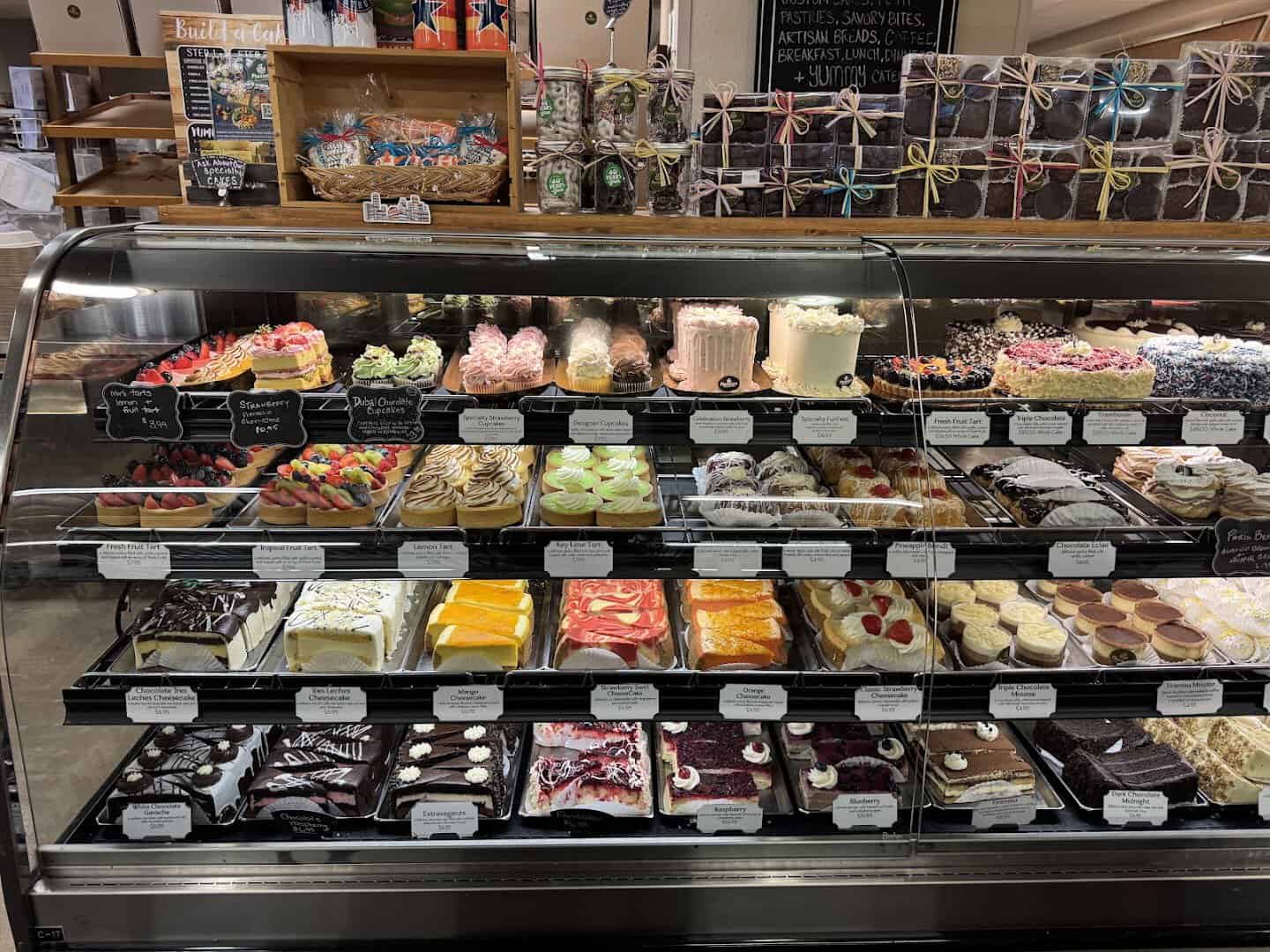 Colorful prepared foods and deli case at Phoenicia Specialty Foods in Houston