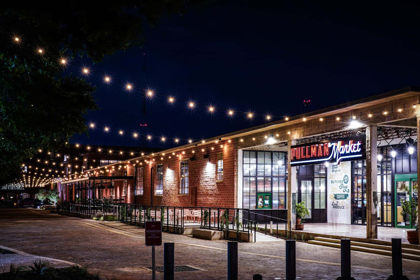 Pullman Market lit up in the evening at the Pearl in San Antonio
