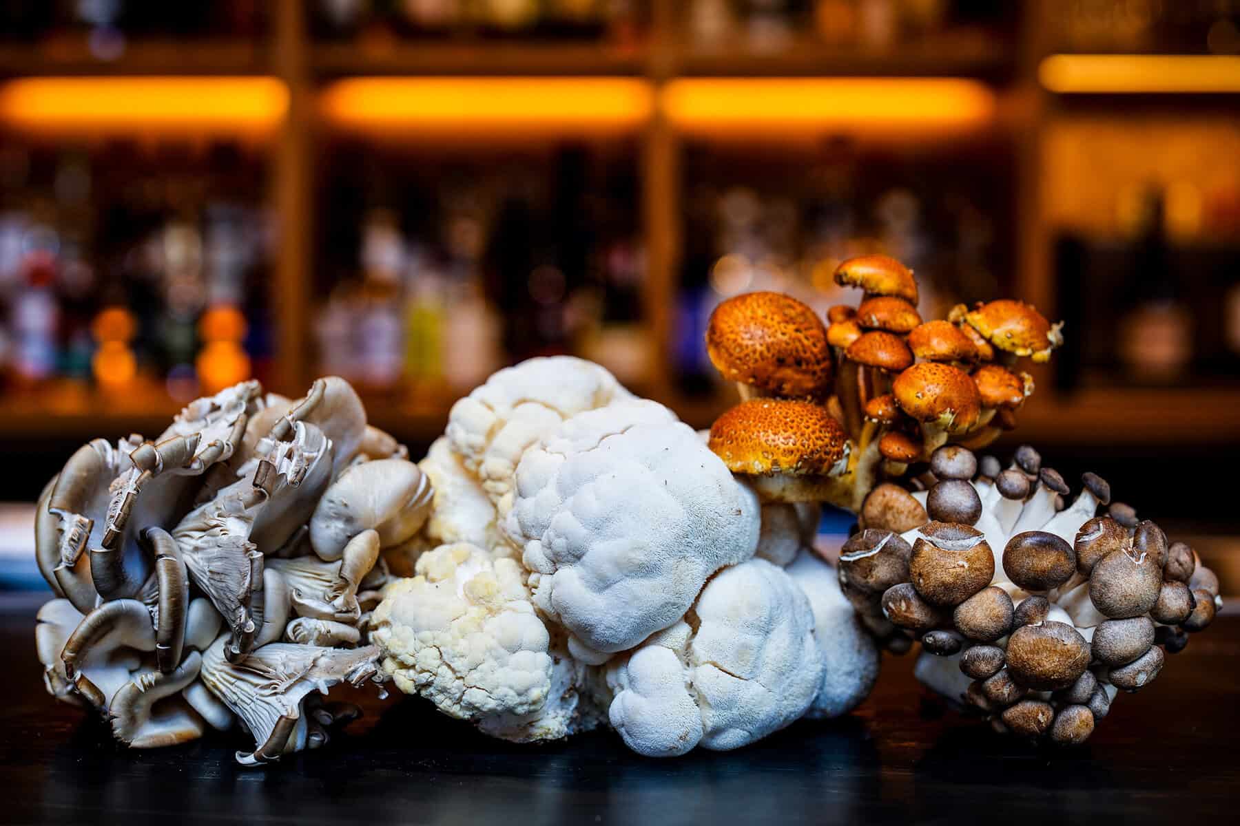 Fresh produce including cauliflower and mushrooms at Pullman Market