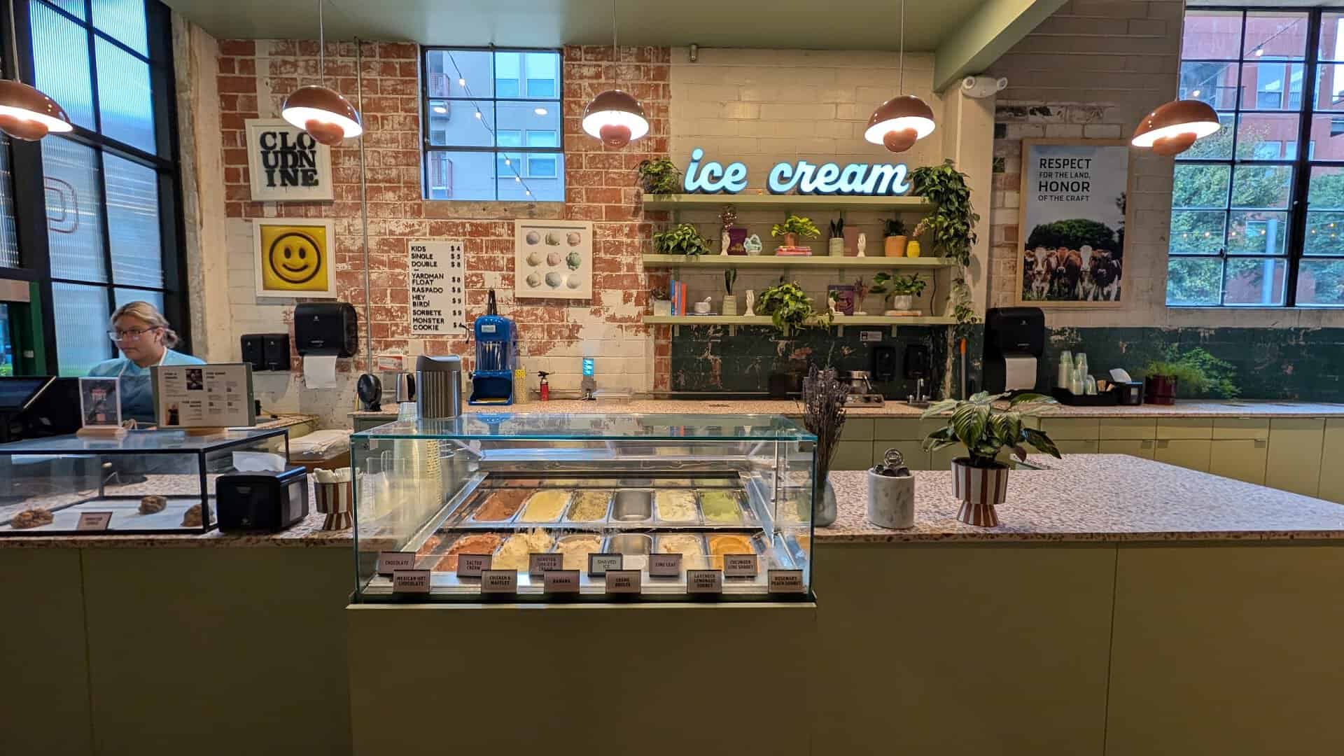 Original steel factory windows by the ice cream counter at Pullman Market in San Antonio