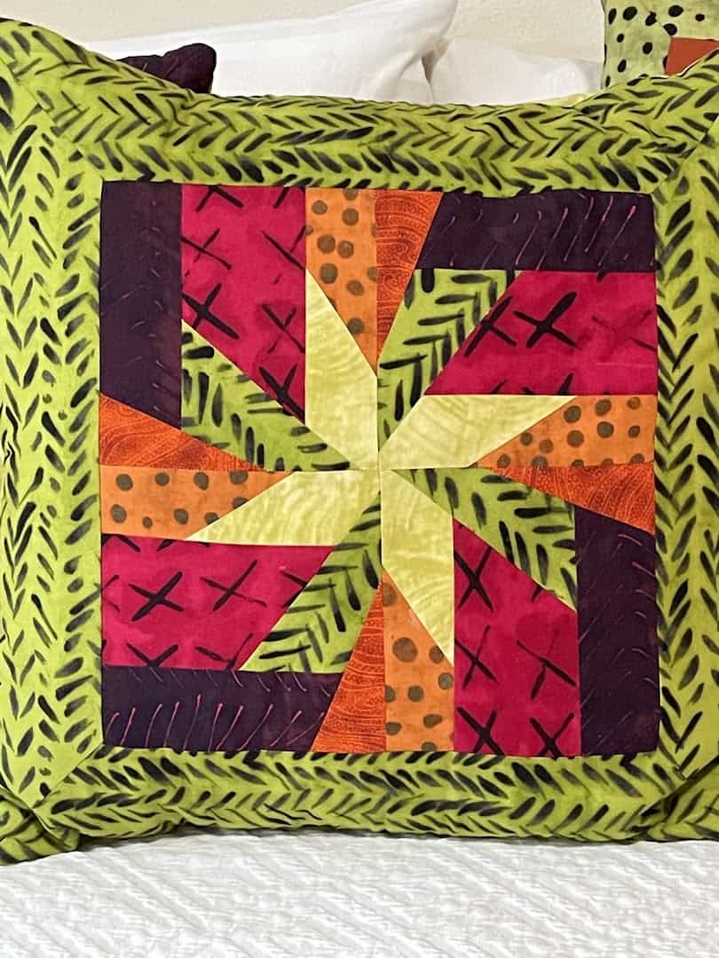 A colorful pinwheel quilt block at The Quilted Skein in La Grange, Texas