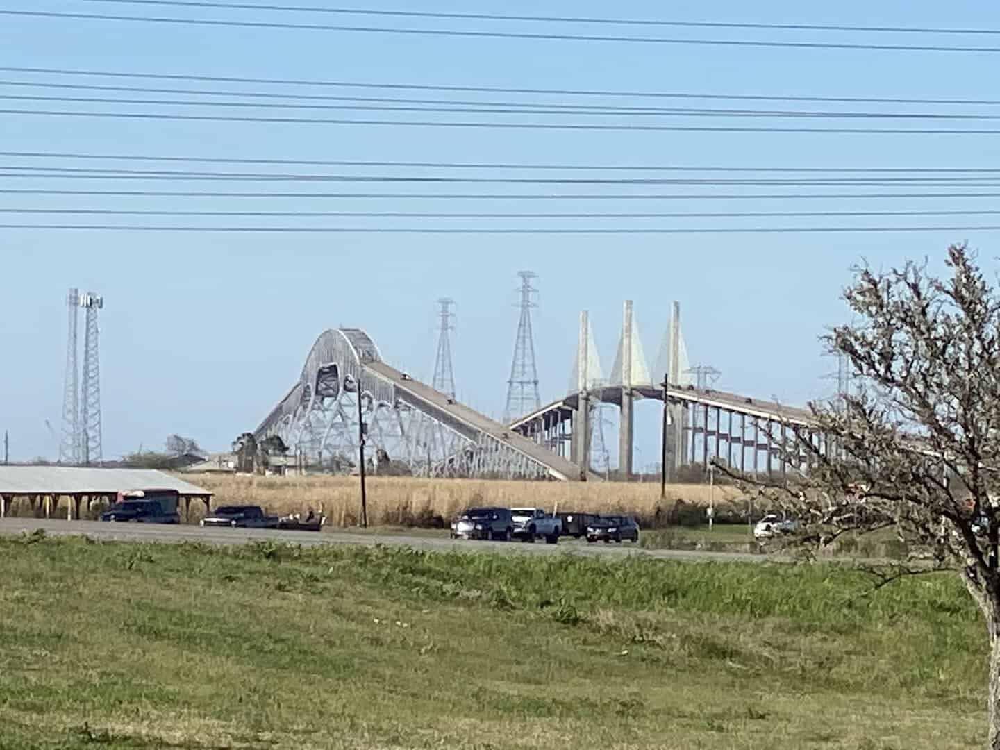 Distant view of the steep Rainbow Bridge and Veterans Memorial Bridge near Port Arthur