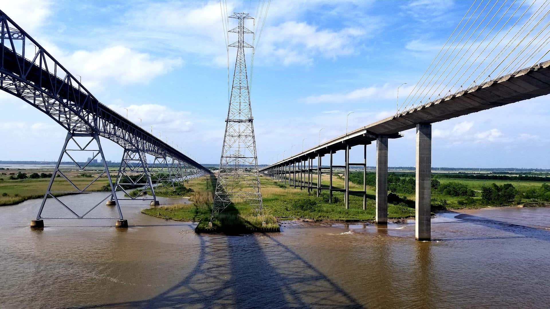 Aerial view of the Rainbow Bridge and the Veterans Memorial Bridge spanning the Neches River, Texas