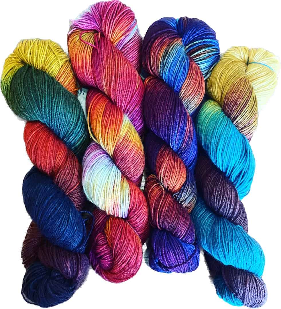 Rainbow of hand-dyed yarn skeins at The Quilted Skein in La Grange, Texas