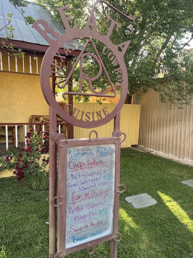 The Reata Texas Cowboy Cuisine sign outside the restaurant in Alpine, Texas
