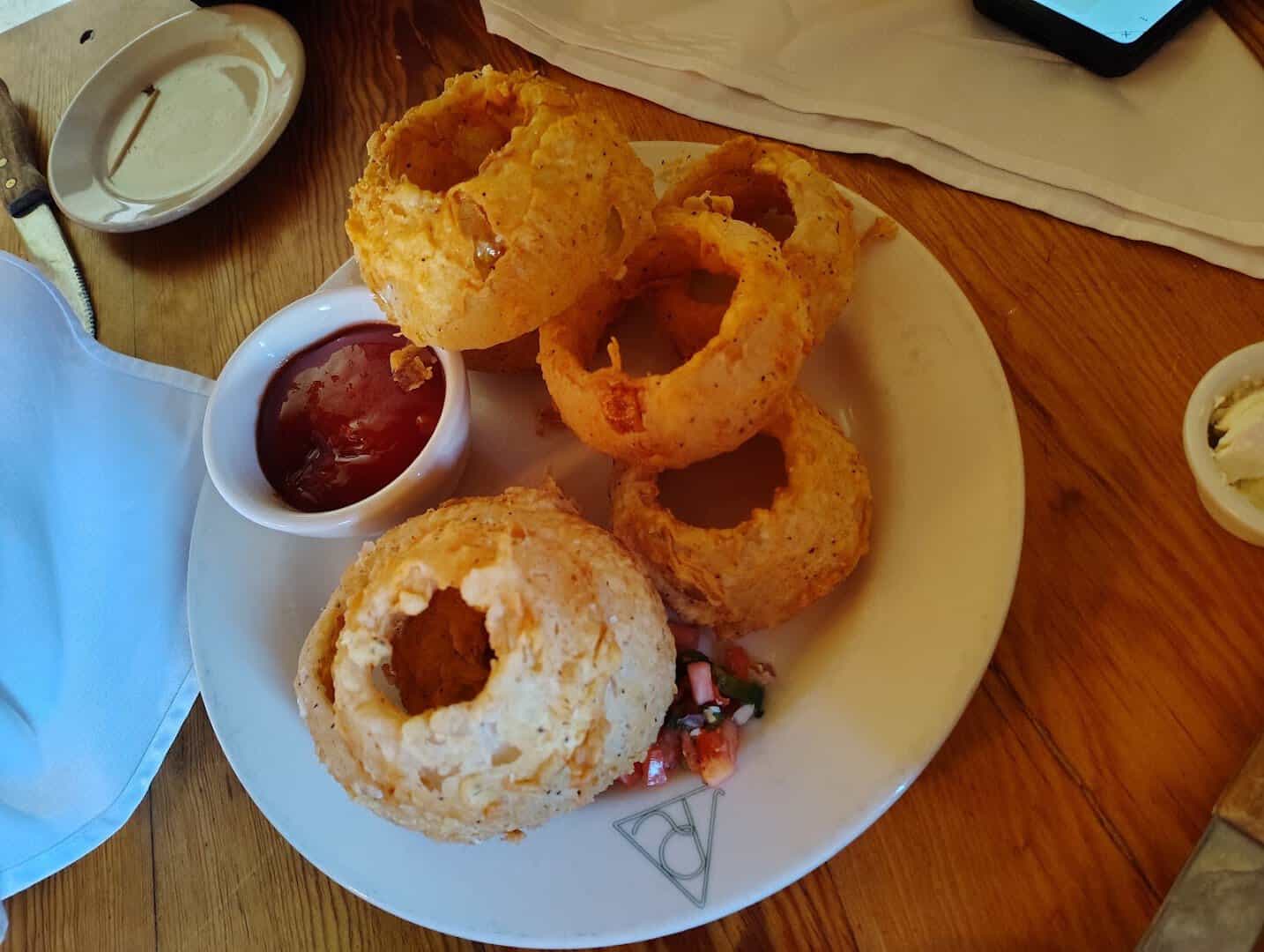 Tumbleweed onion rings with serrano ketchup at Reata in Alpine, Texas