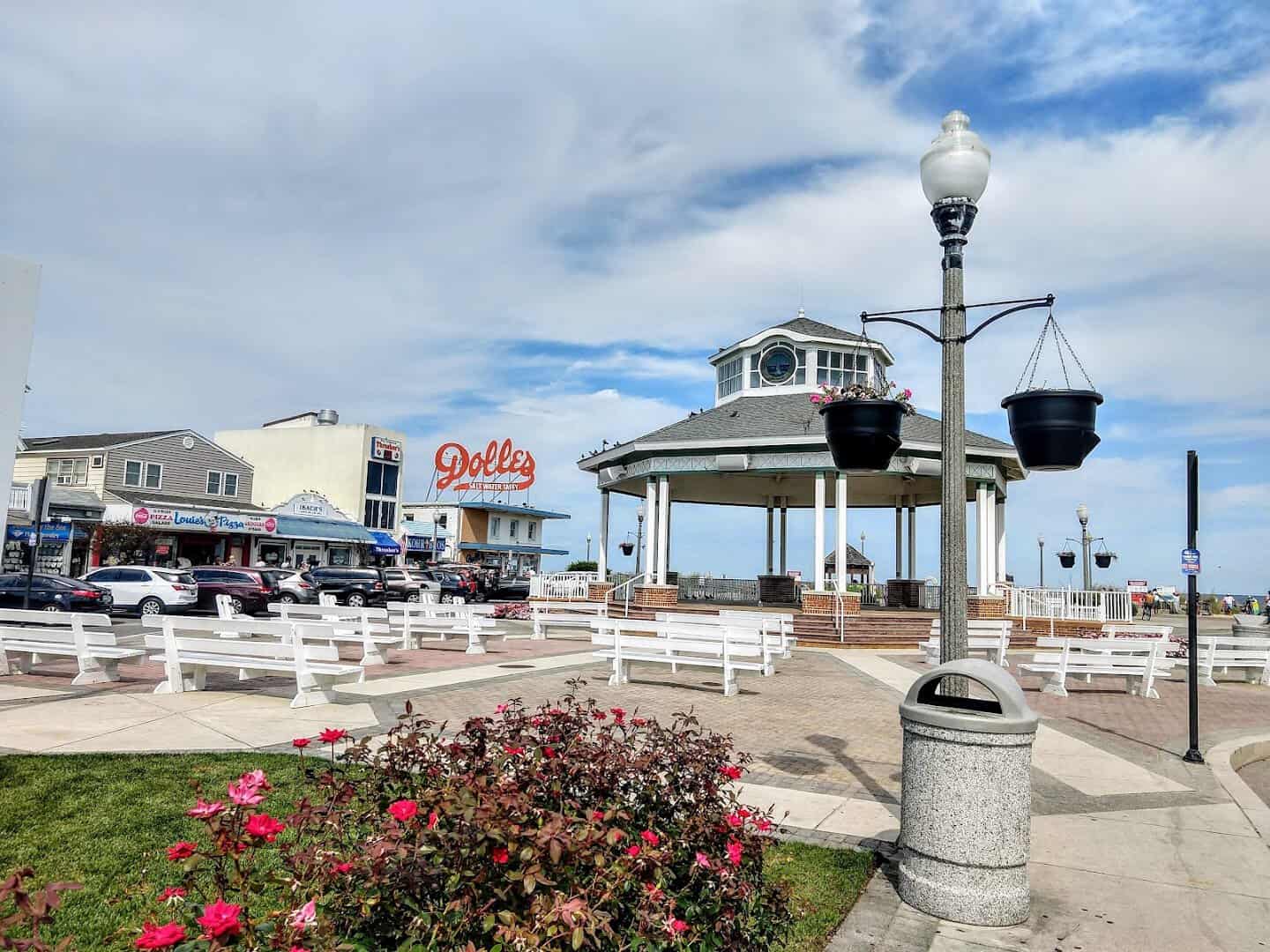 The Rehoboth Beach boardwalk bandstand and Dolles sign in Rehoboth Beach, Delaware