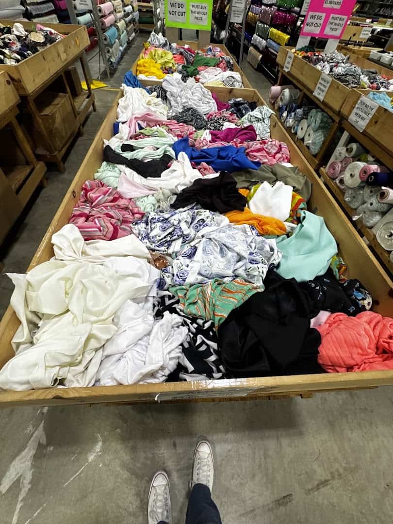 Bins of discounted remnant fabric at Wherehouse Fabrics in Dallas