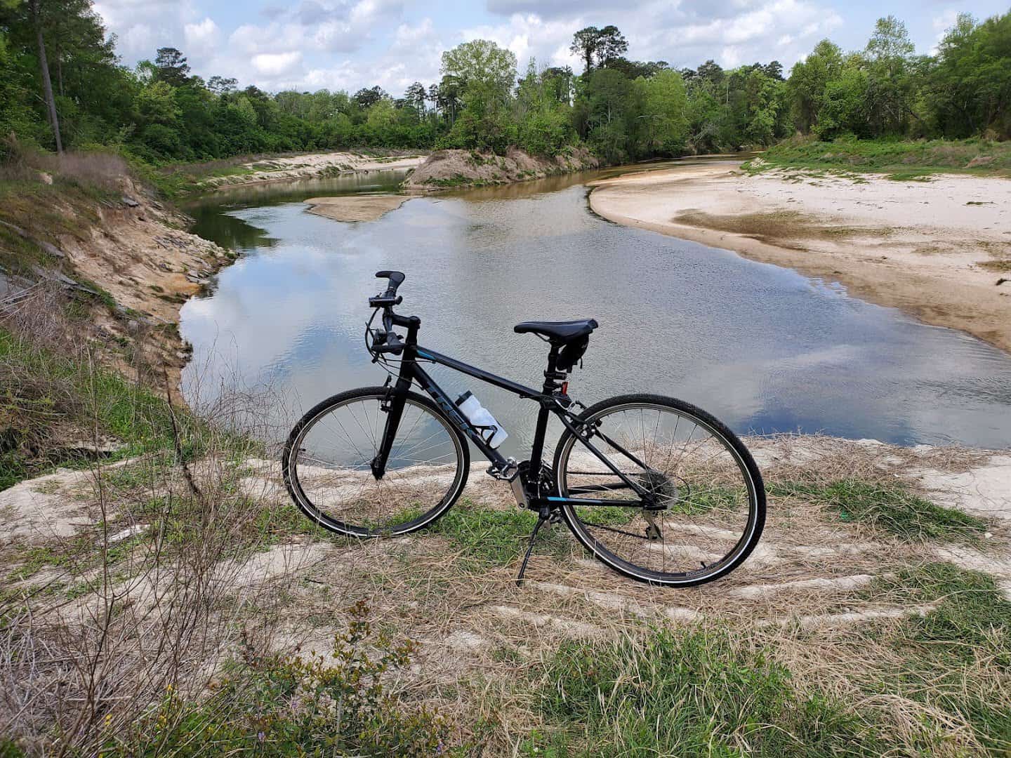 Road bike resting beside the trail along Spring Creek