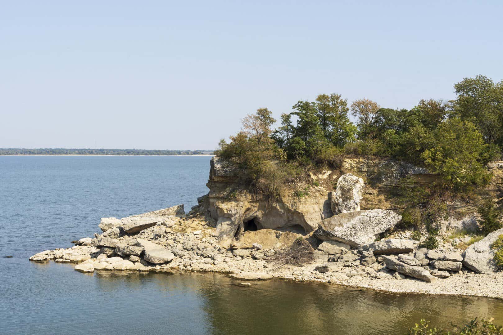 Rock island in the blue water of Lake Texoma at Eisenhower State Park