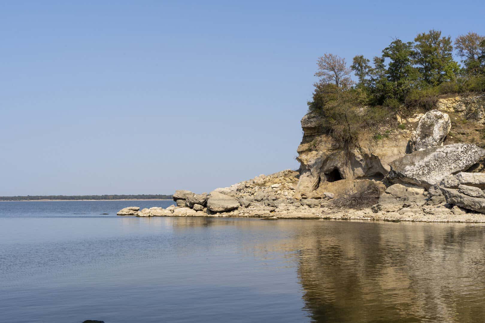 Rocky point over blue Lake Texoma water at Eisenhower State Park