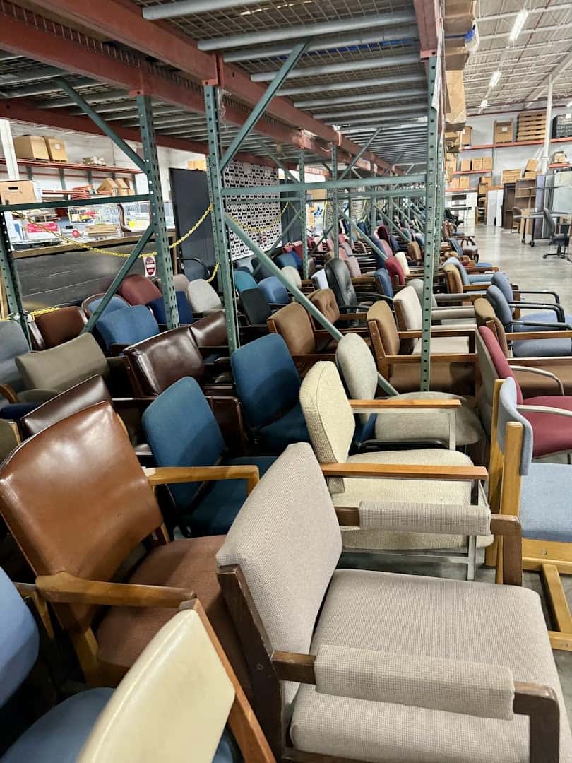 Rows of surplus office chairs at the State Surplus Store in Austin