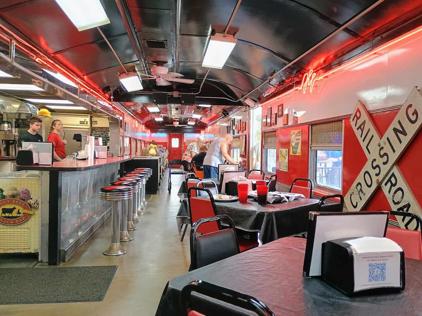 Blue Bell soda counter and chrome stools inside the Runaway Train Cafe rail car