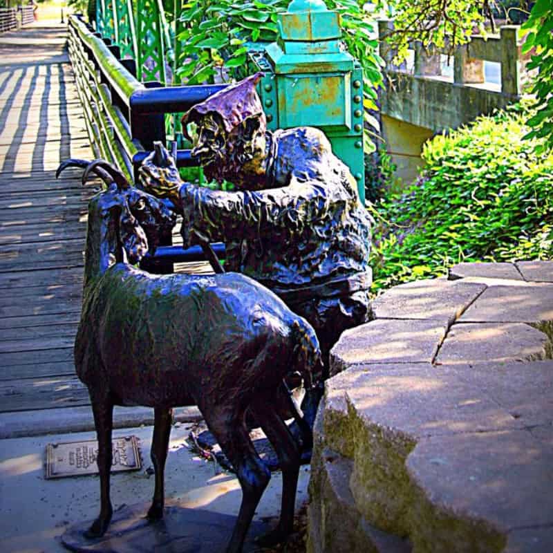Sirena bronze sculpture on the Main Street creek bridge in Salado, Texas