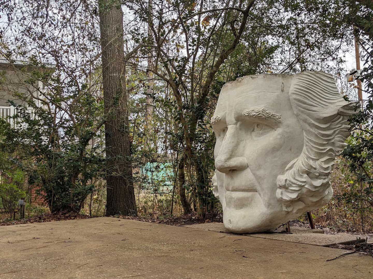 Profile of the giant Sam Houston face sculpture on the grounds