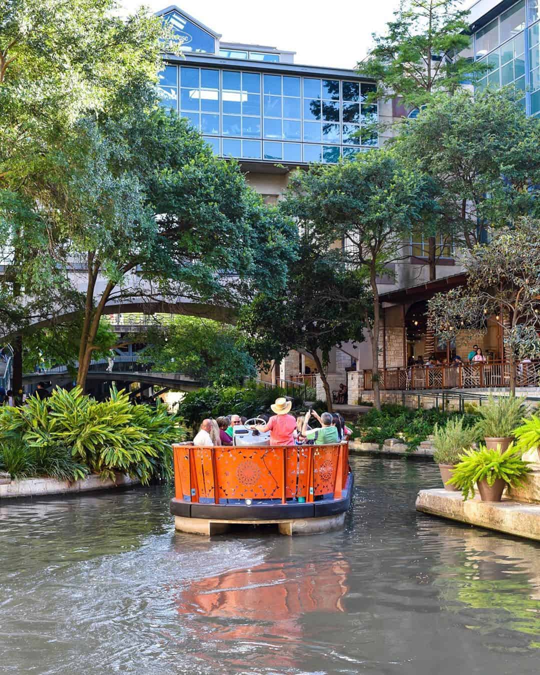 A river barge on the San Antonio River Walk canal in San Antonio, Texas