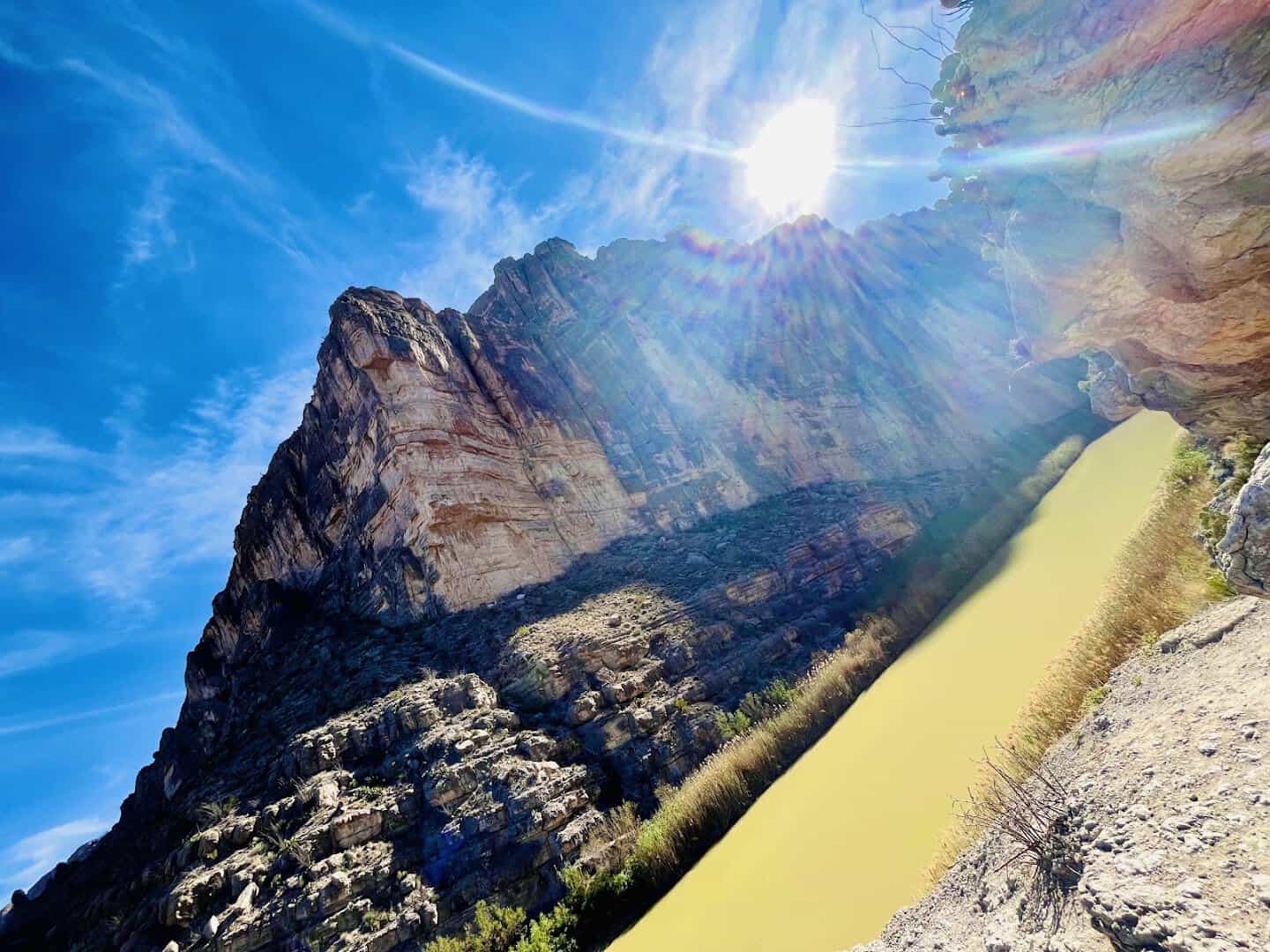 Sunlight over the canyon wall and Rio Grande at Santa Elena Canyon