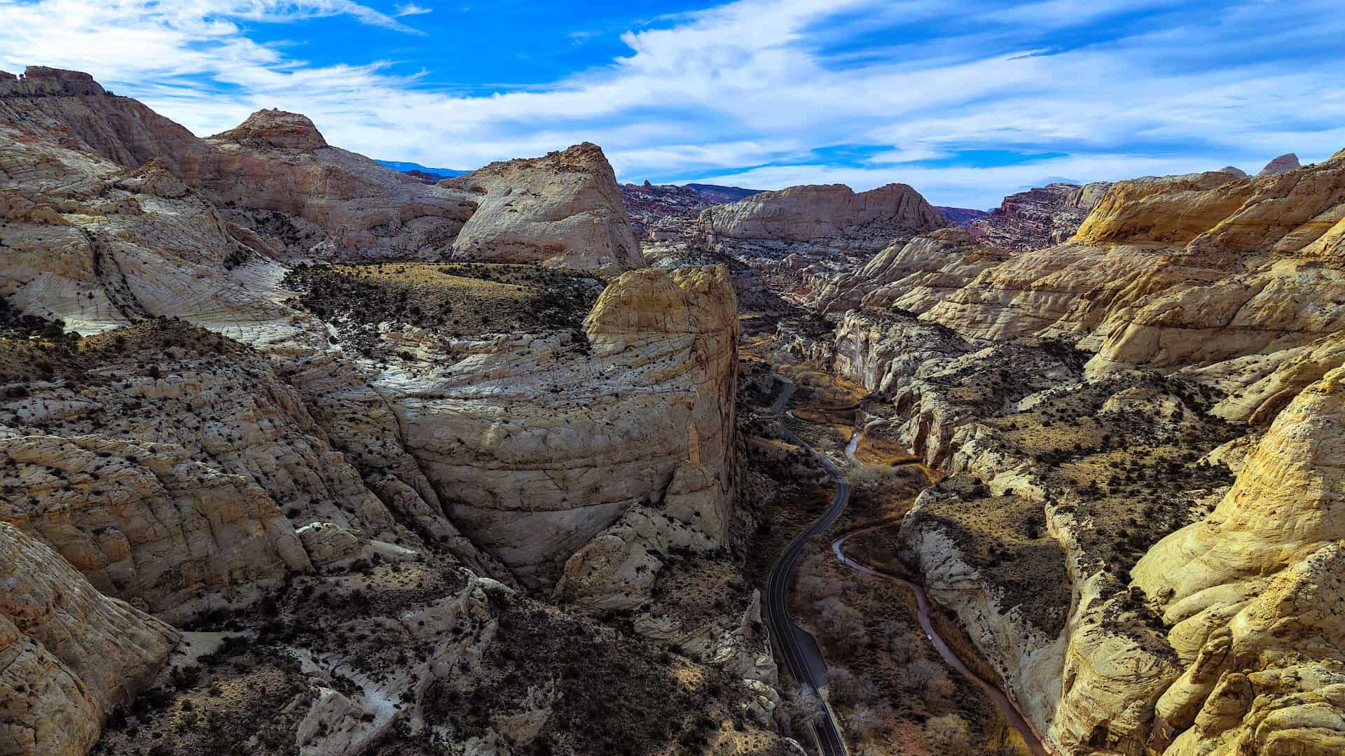 Scenic Byway 12 winding through white slickrock canyon country near Escalante, Utah