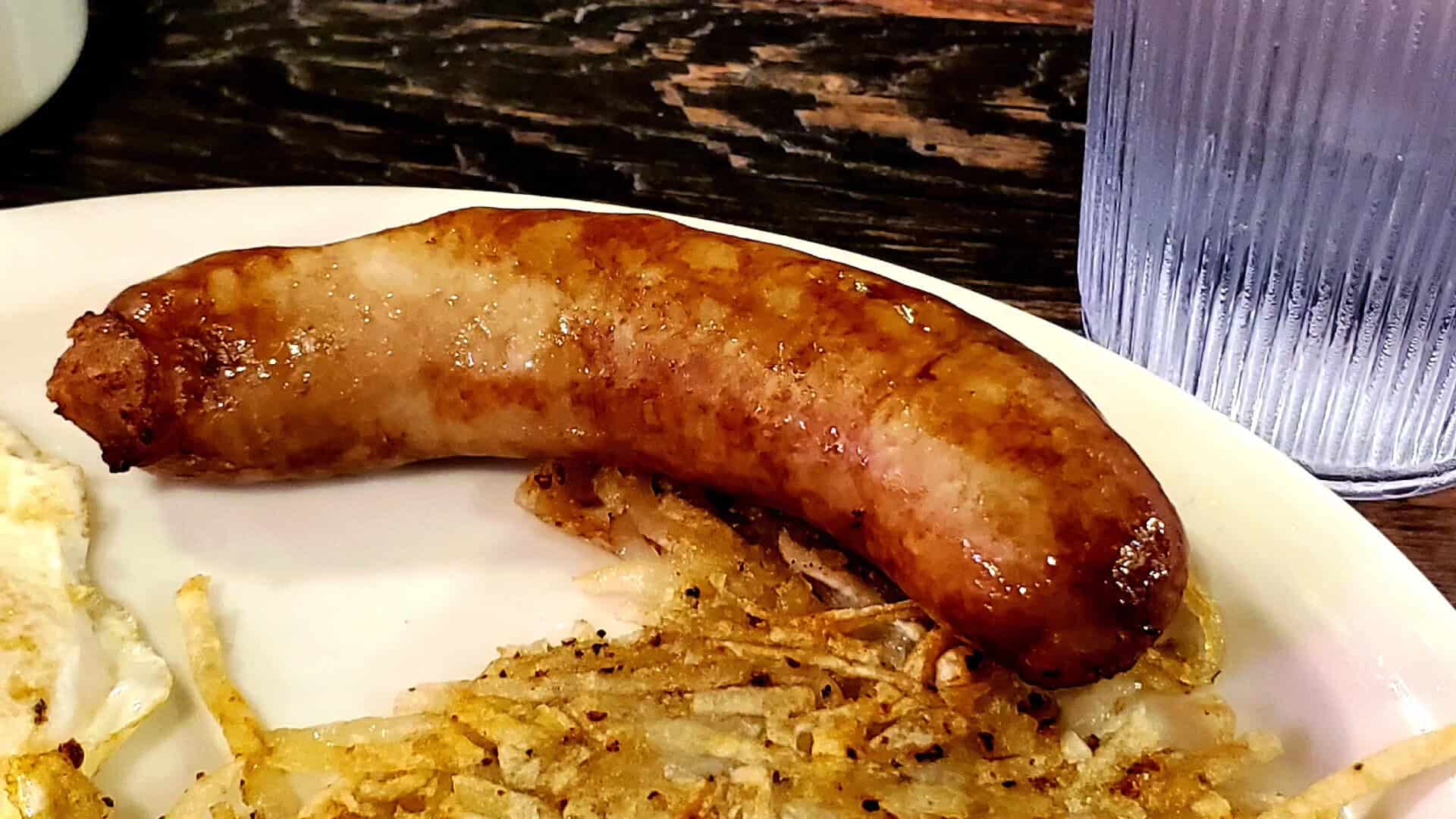 Bratwurst sausage with hash browns at Schilo's in San Antonio