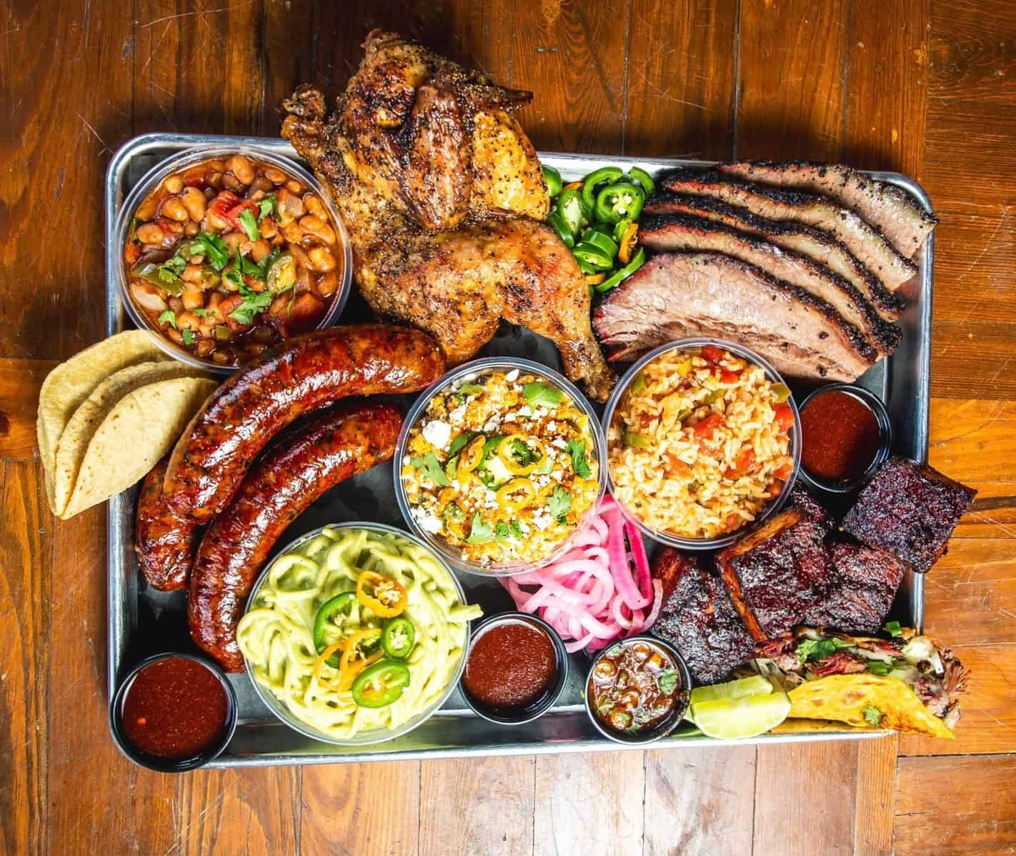 Barbecue tray with brisket, chicken and sausage at Schoepf's BBQ in Belton, Texas