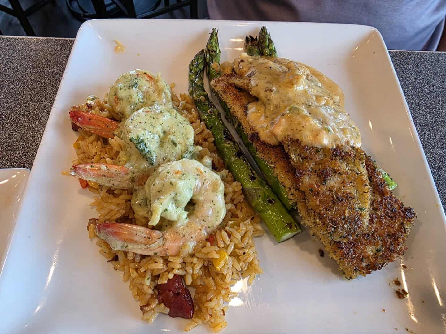 Crusted Gulf fish and shrimp over rice at Sea Ranch Restaurant in South Padre Island