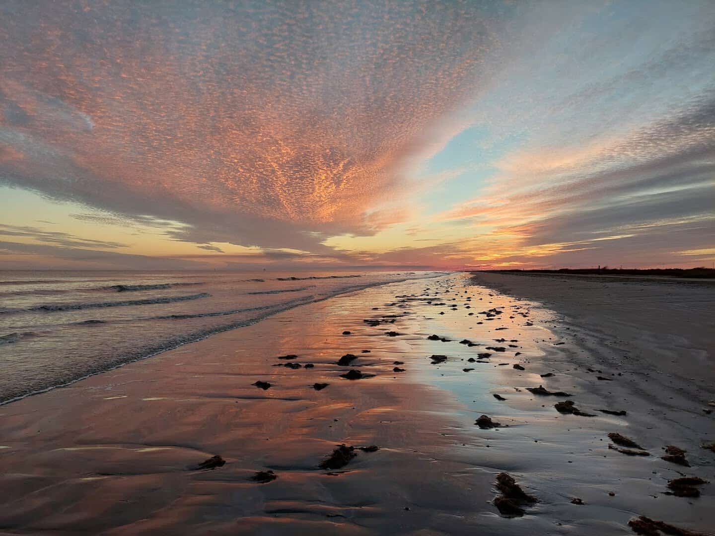 Sunset over the wild empty Gulf beach at Sea Rim State Park, Texas