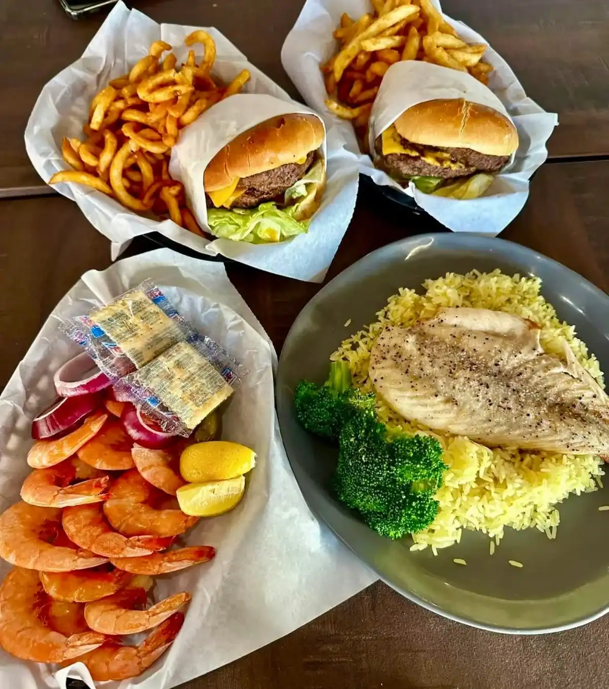 Spread of fish, shrimp and burgers at Snoopy's Pier in Corpus Christi