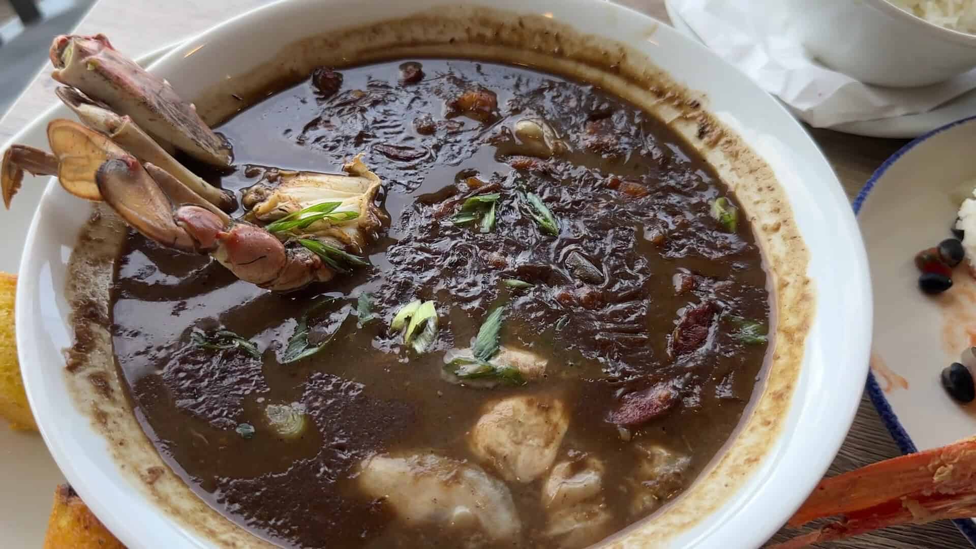 Dark seafood gumbo with a crab claw at Katie's Seafood House in Galveston