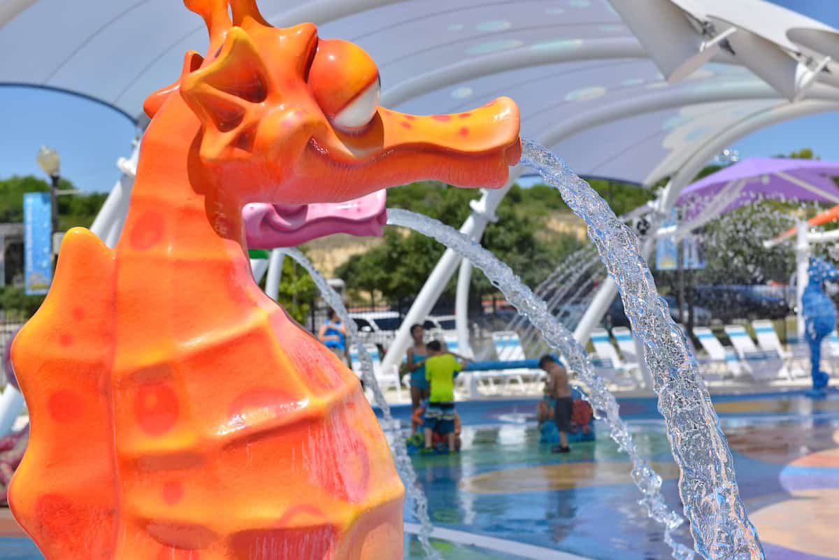 Colorful seahorse water feature spraying at Morgan's Inspiration Island splash park