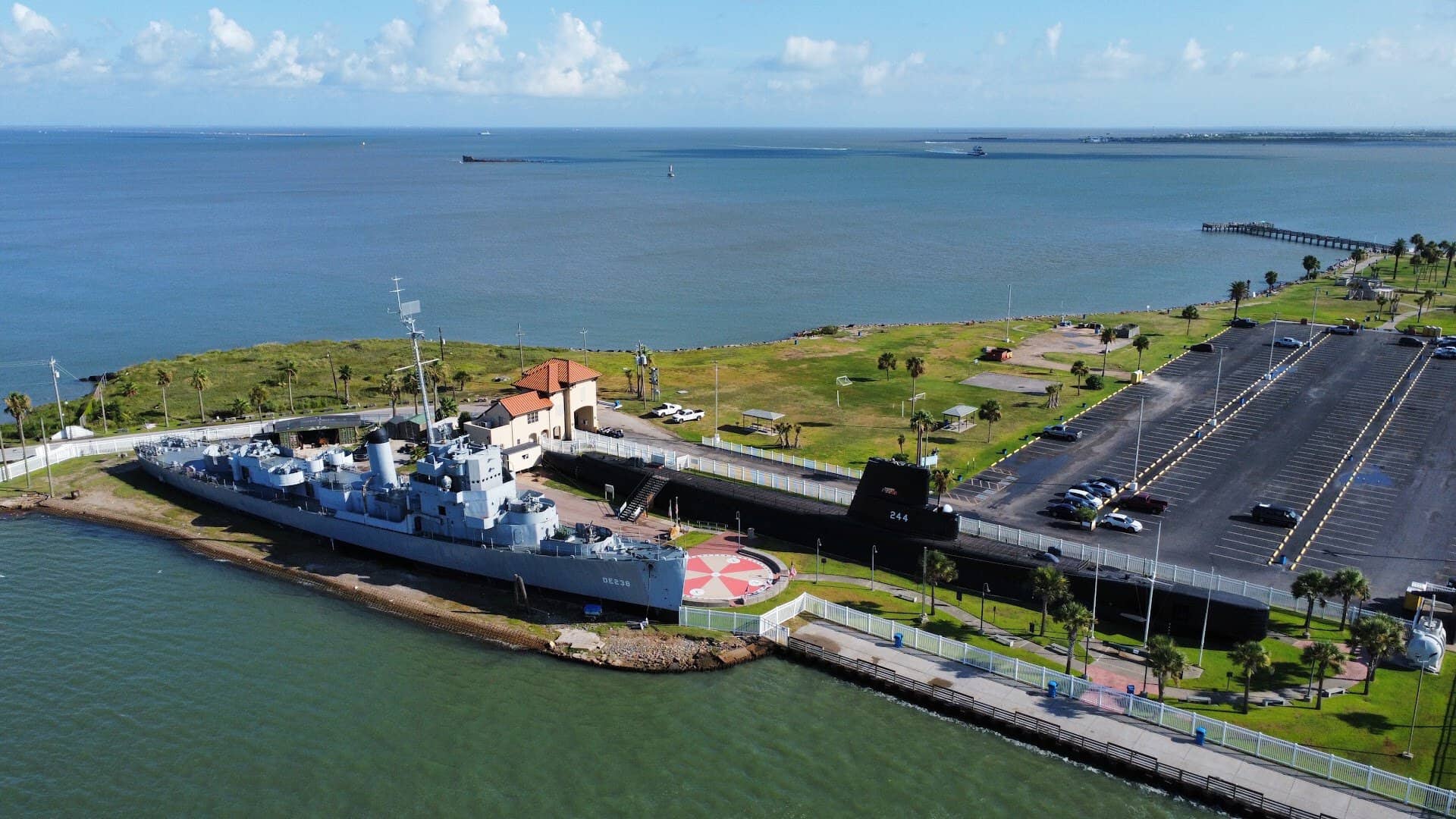 The fishing pier and ship channel beside Seawolf Park in Galveston, Texas