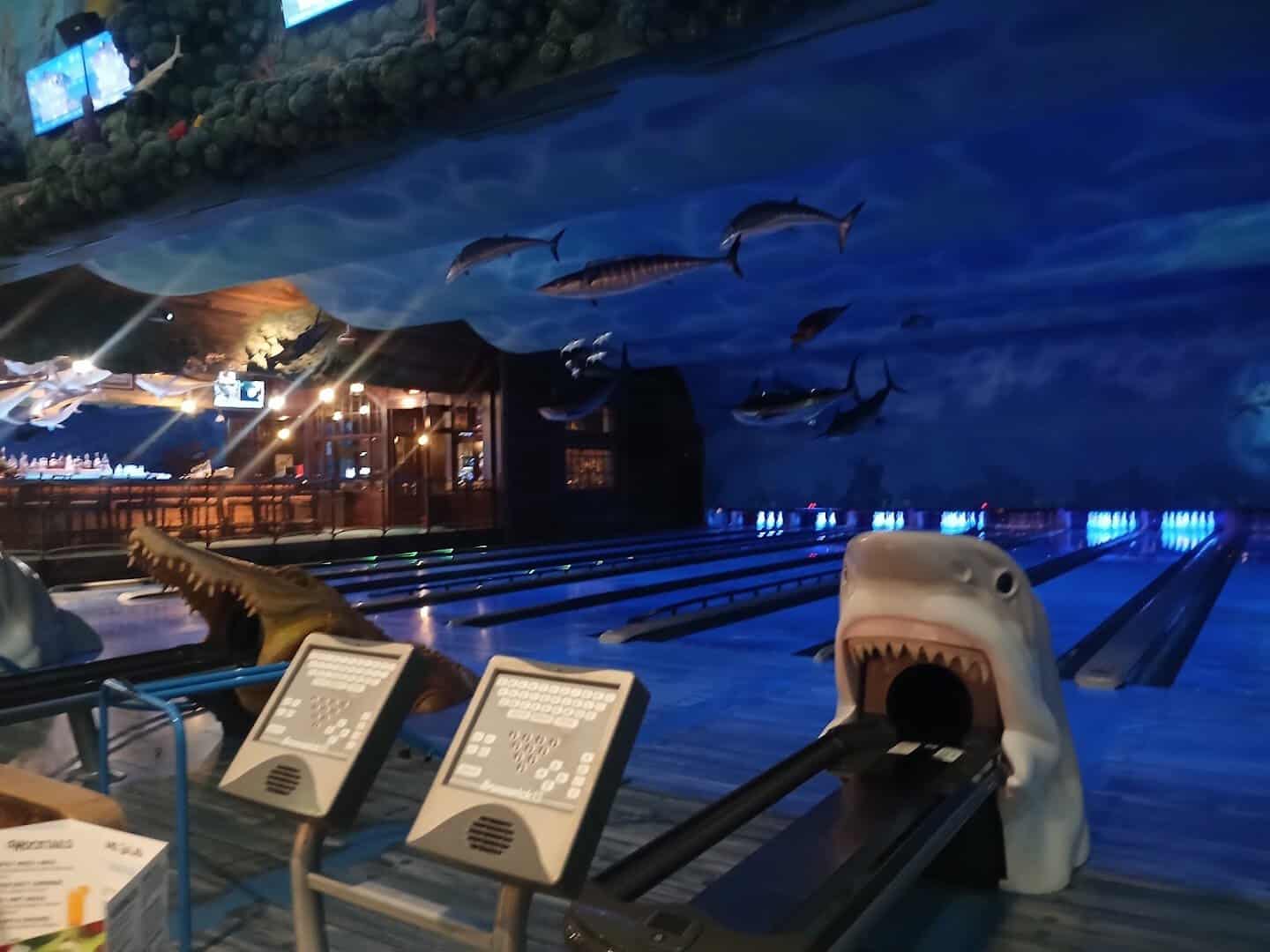 Shark shaped ball return at the end of the bowling lanes at Uncle Buck's Fishbowl and Grill in Round Rock