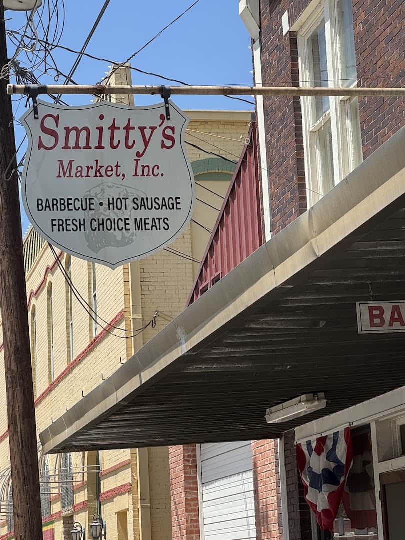 Smitty's Market storefront sign and awning in downtown Lockhart, Texas